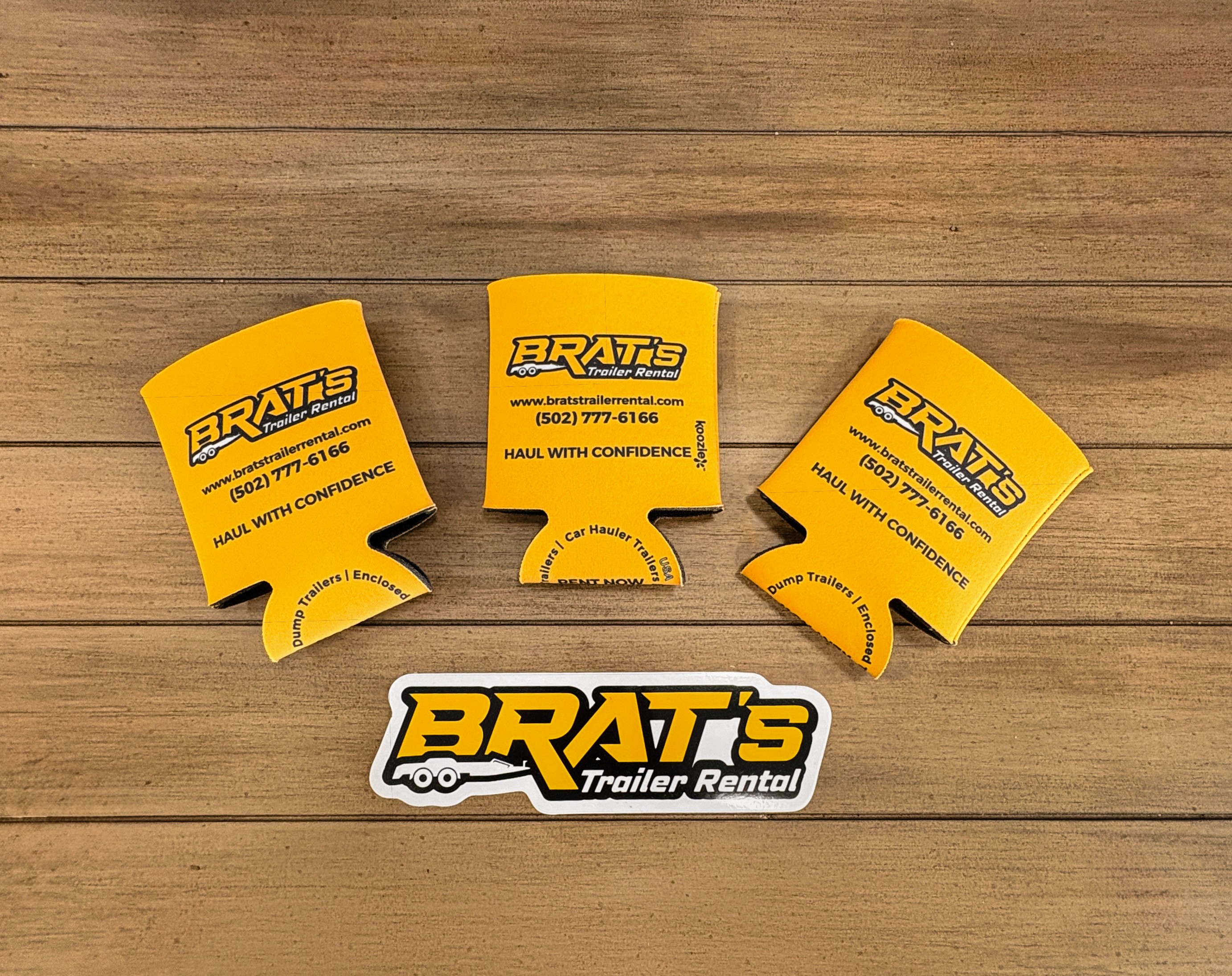 BRAT's Trailer Rental yellow koozies and sticker
